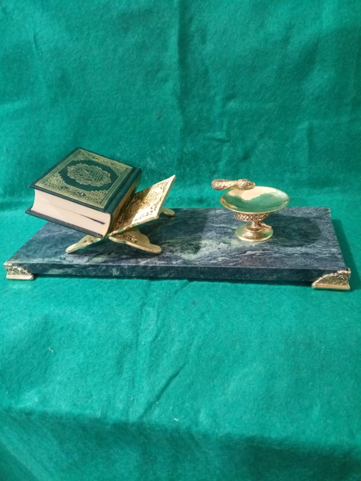 Quran stand in bronze on a marble base, full view